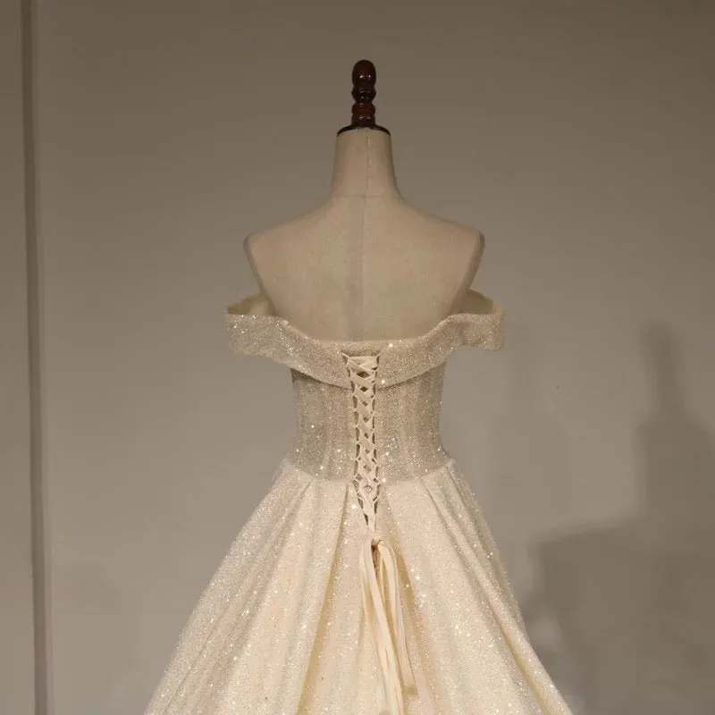 Off shoulder cape glitter fabric shiny looking ball gown skirt bride gowns with ivory and off white color