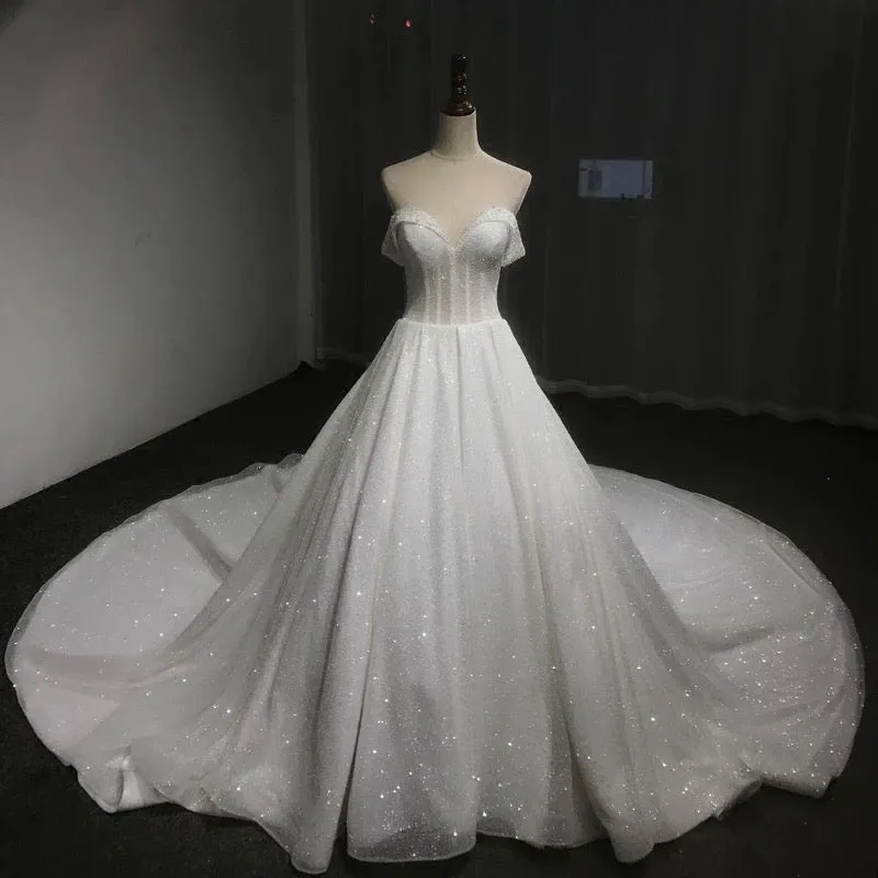 Off shoulder cape glitter fabric shiny looking ball gown skirt bride gowns with ivory and off white color