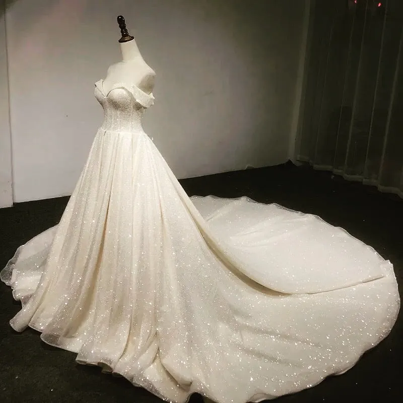 Off shoulder cape glitter fabric shiny looking ball gown skirt bride gowns with ivory and off white color